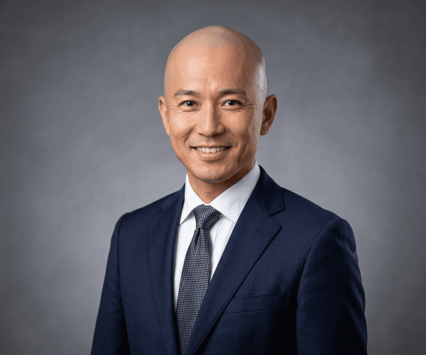 Professional headshot after bald filter showing clean bald look