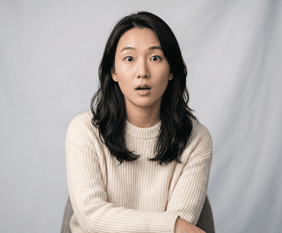 Portrait after AI face editor surprised expression edit