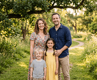 Family photo after correction showing all subjects with naturally open, smiling eyes